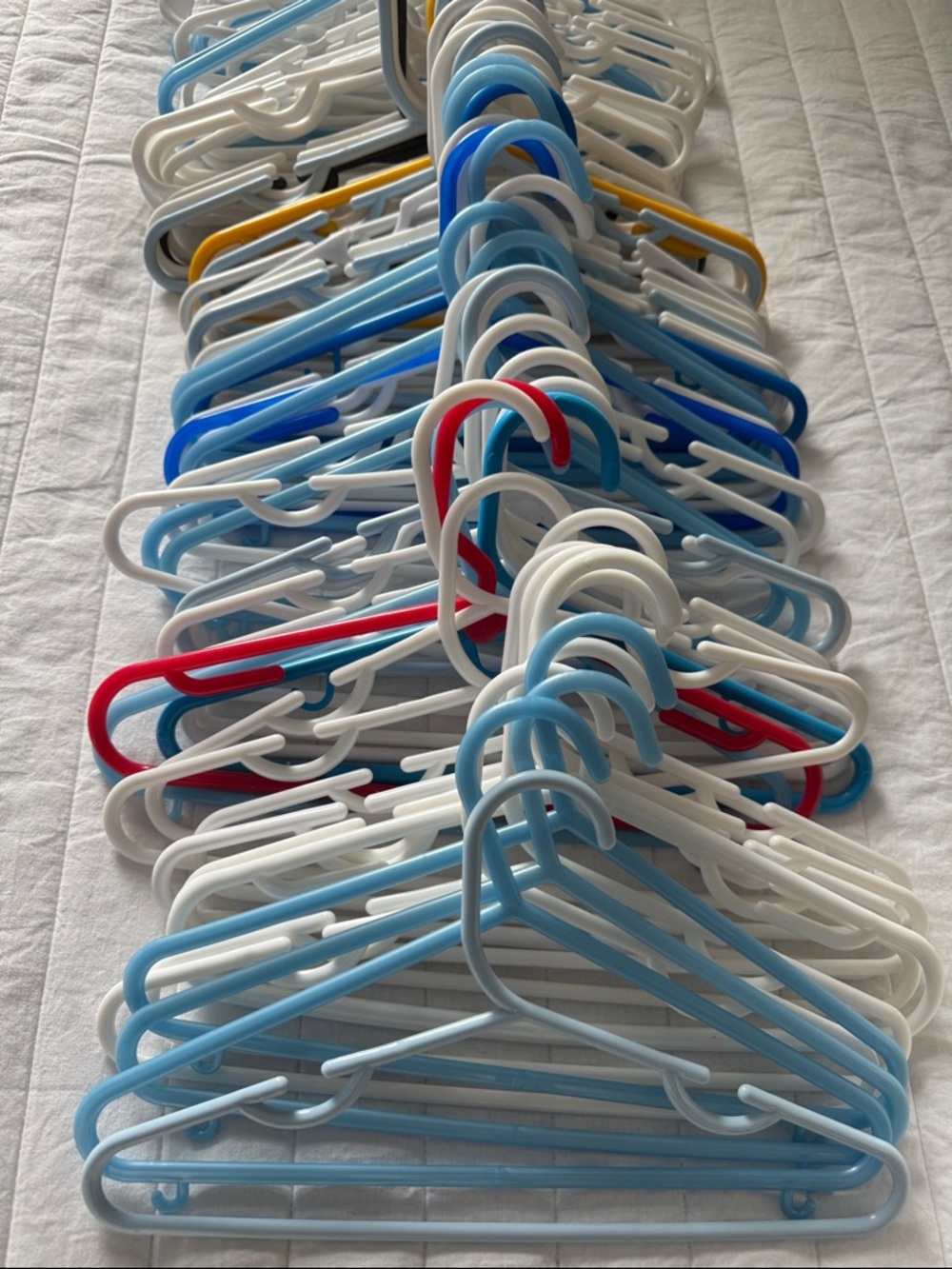 Assorted Plastic Clothes Hangers - White, Light Blue, Blue, Red